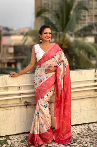 Coral red tussar silk kalamkari printed saree with zari woven border