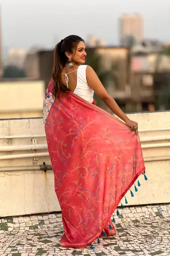 Coral red tussar silk kalamkari printed saree with zari woven border