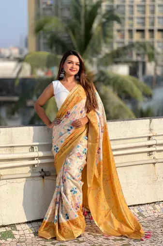 Gold tussar silk kalamkari printed saree with zari woven border