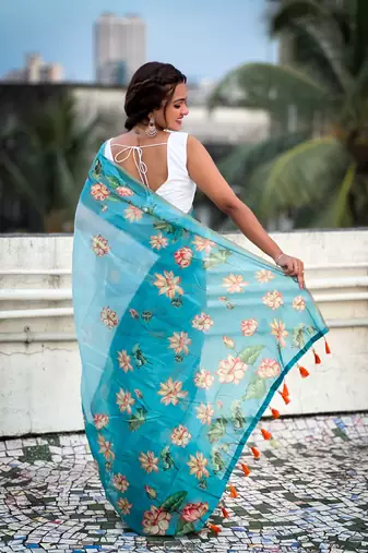 Sky blue chanderi cotton pichwai printed saree with zari woven border