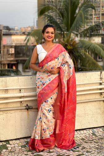 Coral red tussar silk kalamkari printed saree with zari woven border