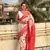 Coral red tussar silk kalamkari printed saree with zari woven border