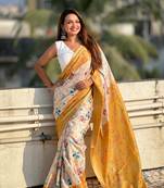 Gold tussar silk kalamkari printed saree with zari woven border