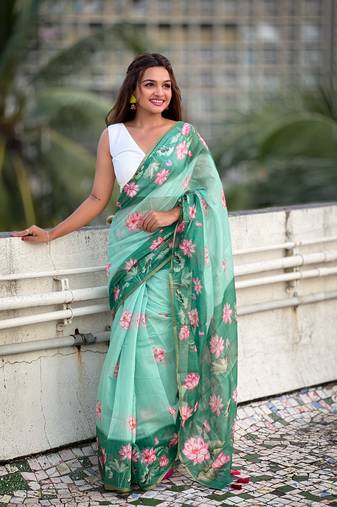 Sea green chanderi cotton pichwai printed saree with zari woven border