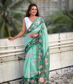 Sea green chanderi cotton pichwai printed saree with zari woven border