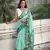 Sea green chanderi cotton pichwai printed saree with zari woven border