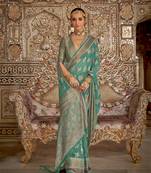 Elora soft georgette butta weaving banarasi saree (light green)