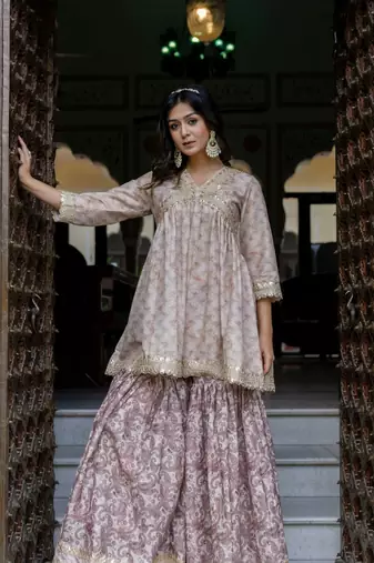 Jaipurite women embroidered  alia cut kurta & flared sharara with dupatta