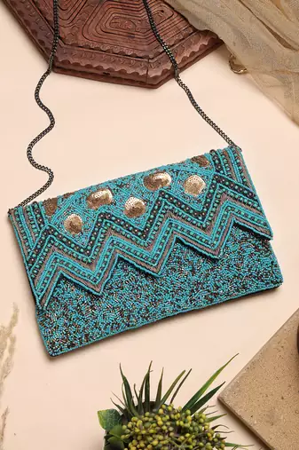 Anekaant tribal turquoise blue & copper chevron embellished cotton canvas sling bag