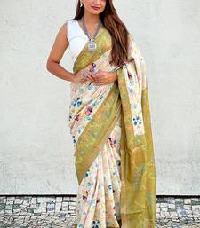 Mehendi green tussar silk kalamkari printed saree with zari woven border