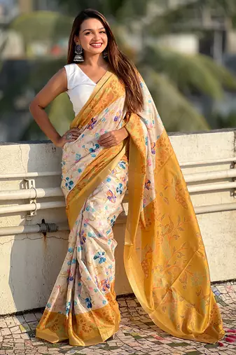 Gold tussar silk kalamkari printed saree with zari woven border