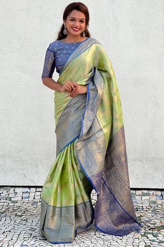 Green kanjivaram soft tissue silk leheriya traditional zari woven saree