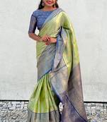 Green kanjivaram soft tissue silk leheriya traditional zari woven saree