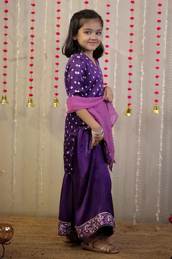 Purple bandhej kurta with sharara set and dupatta.