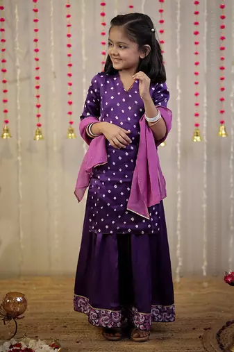 Purple bandhej kurta with sharara set and dupatta.