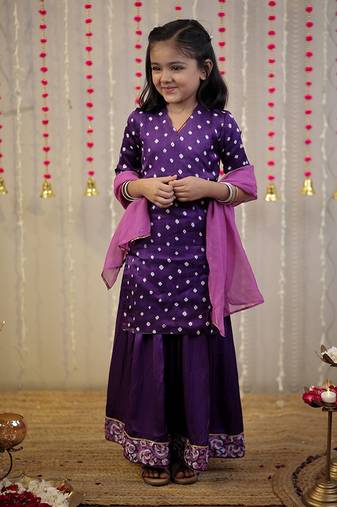 Purple bandhej kurta with sharara set and dupatta.