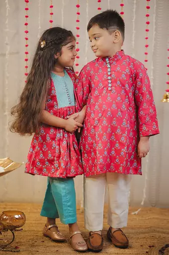 Pink block printed kurta with pants.