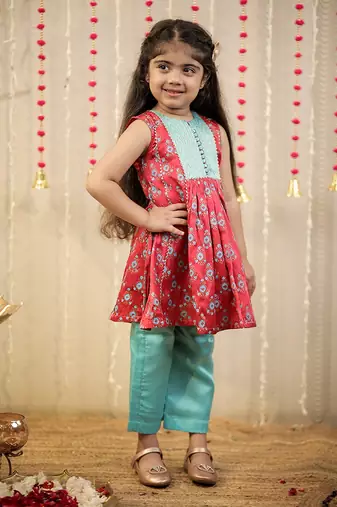Pink block printed kurta with pants.