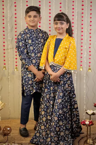 Ink blue block printed skirt with blouse paired with shrug.