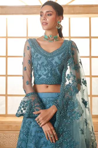 aqua blue net thread work wedding lehenga