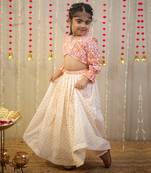 Peach orange block printed crop top with skirt.