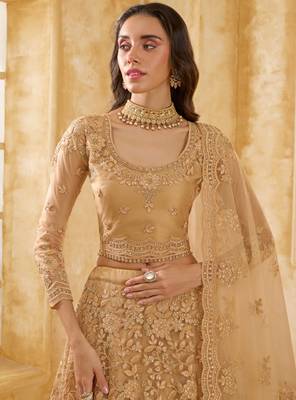 Spellbinding Golden Cording & Thread Embroidered With Stone Work Net With Silk Inner Lehenga Choli For Wedding 3