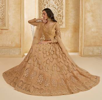Spellbinding Golden Cording & Thread Embroidered With Stone Work Net With Silk Inner Lehenga Choli For Wedding 3