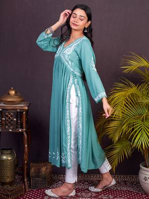 Green hand embroided modal a-line chikankari kurti 4