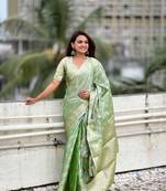 Green tissue silk saree with weaving jari meenakari designer looks