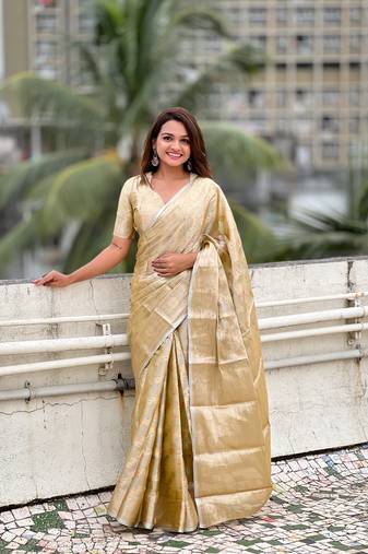 Yellow tissue silk saree with weaving jari meenakari designer looks