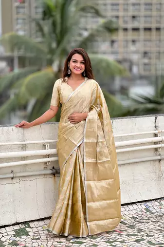 Yellow tissue silk saree with weaving jari meenakari designer looks