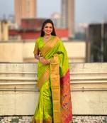 Green soft silk c graceful wevon nath meenakari designer saree