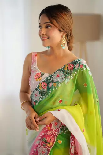 Green georgette c style pedding with embroidery work saree