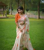 Rich looks floral printed off white muga cotton saree for sophisticated looks