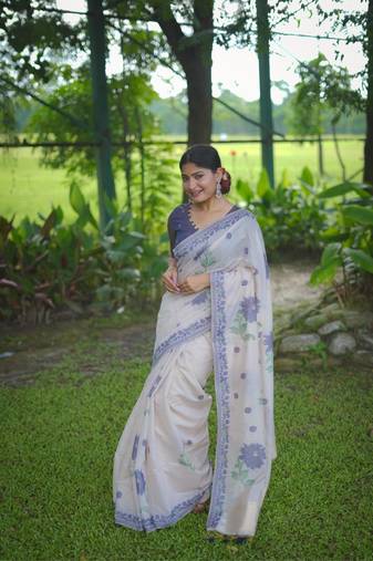 Rich looks floral printed off white muga cotton saree for sophisticated looks