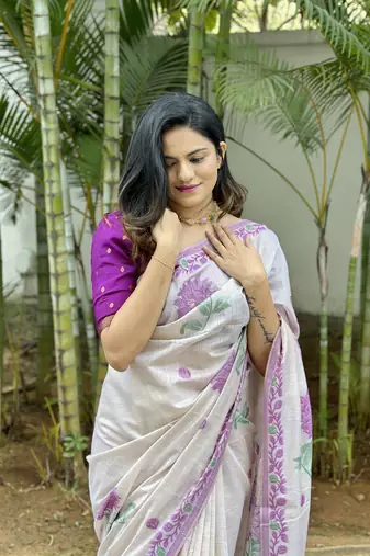 Rich looks floral printed off white muga cotton saree sophisticated looks