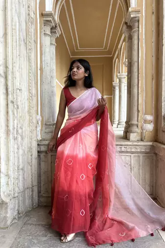 Grace and tradition meet in the exquisite Kota Doria Ombre Saree.