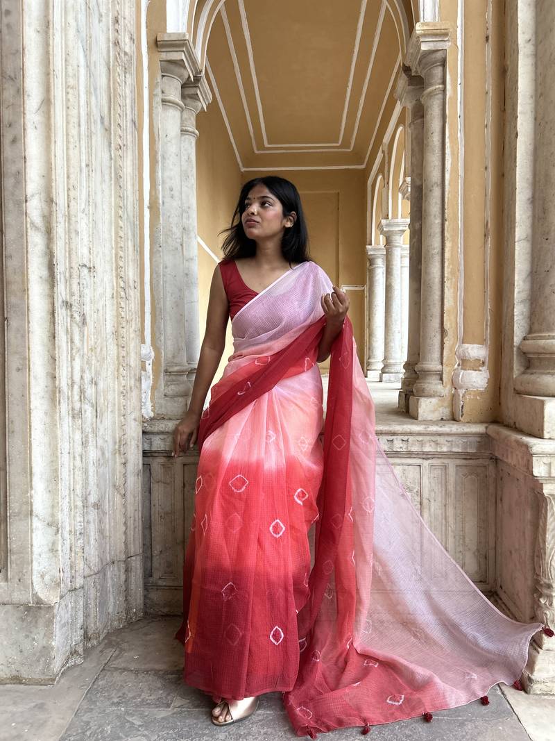 Grace and tradition meet in the exquisite Kota Doria Ombre Saree.