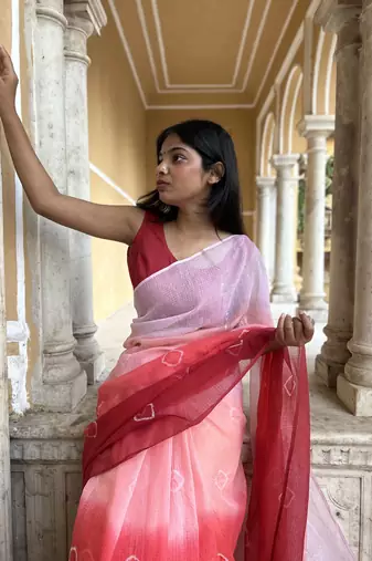 Grace and tradition meet in the exquisite Kota Doria Ombre Saree.
