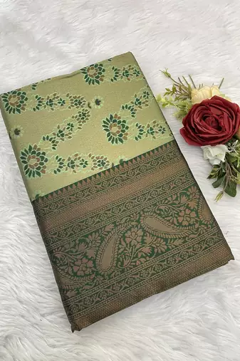 Green Banarasi silk blend copper zari weaving woven leaf design saree with unstitched blouse