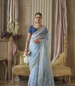 Designer sky blue hand worked tissue silk saree with blouse