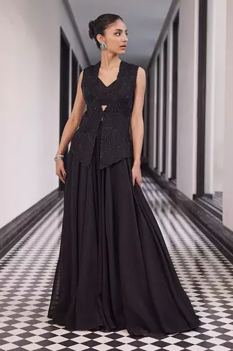 tone on tone emb on waistcoat and organza lengha and embellished bustier