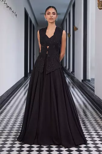 tone on tone emb on waistcoat and organza lengha and embellished bustier