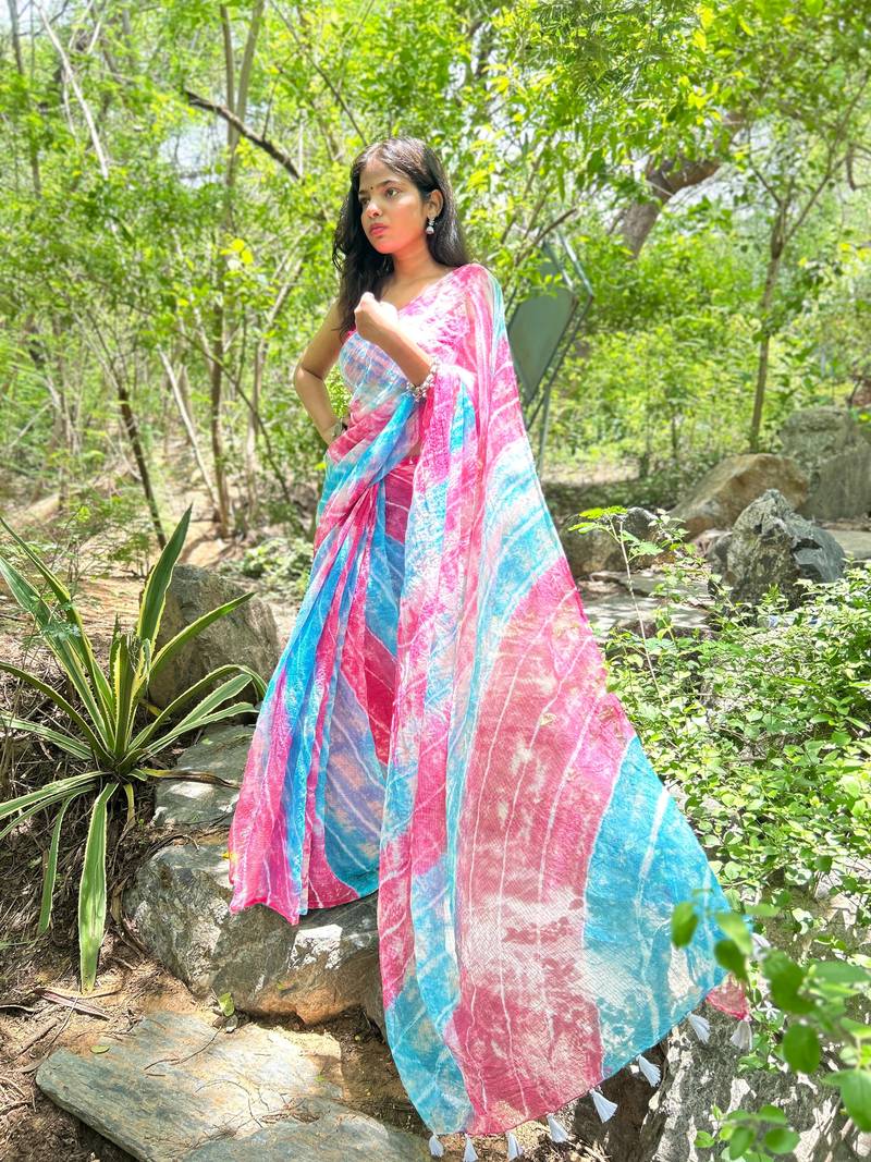 Grace and tradition meet in the exquisite Kota Doria Rainbow color Saree.