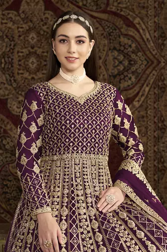 Embroidered net purple floor length gown