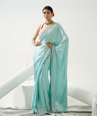 Ocean green sequin saree with border work paired with shaded sequin pink blouse 2