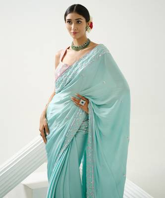 Ocean green sequin saree with border work paired with shaded sequin pink blouse 4
