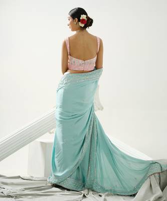 Ocean green sequin saree with border work paired with shaded sequin pink blouse 5