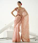 Coffee floral handcrafted saree in organza paired with maroon sequin blouse and belt