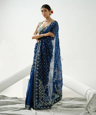 Blue organza floral handcrafted saree paired with sea blue geometric sequin blouse 1